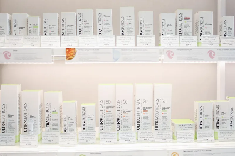 Neatly arranged skincare products on bright store shelves